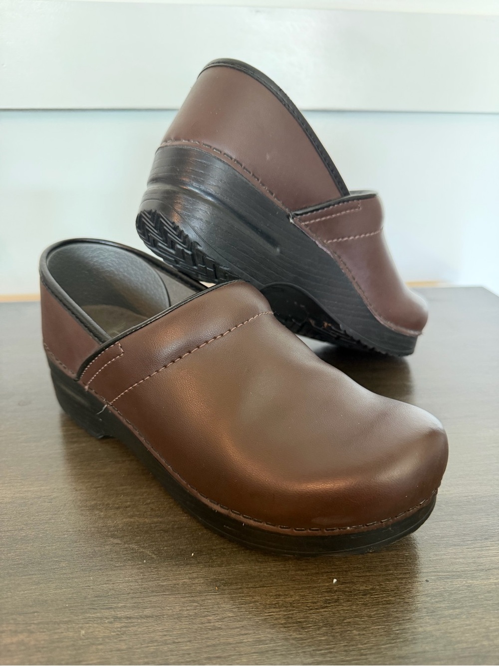 Dansko women's Brown Clog with black trim